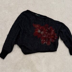 Chic Off-the-Shoulder Black Sweater with Red Floral Design